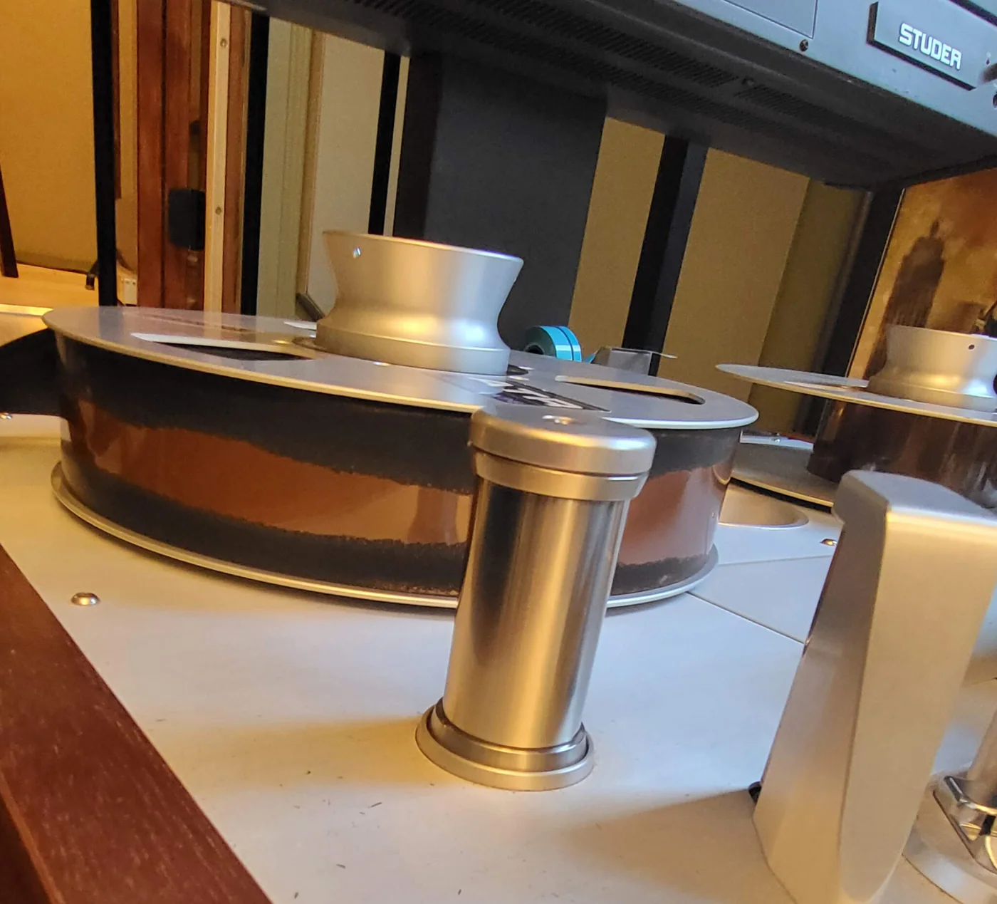 Oxide shedding off a 2-inch tape reel